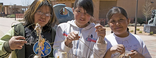 Students participate in a hands-on activity at the museum.